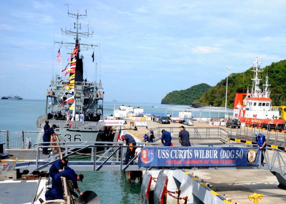 US Navy 111206-N-KK935-182 USS Curtis Wilbur moors next to Royal Malaysian Navy ship
