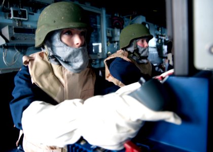 US Navy 120124-N-NL401-085 Gunner's Mate Seaman Dayna C. Balek operates a tactical console