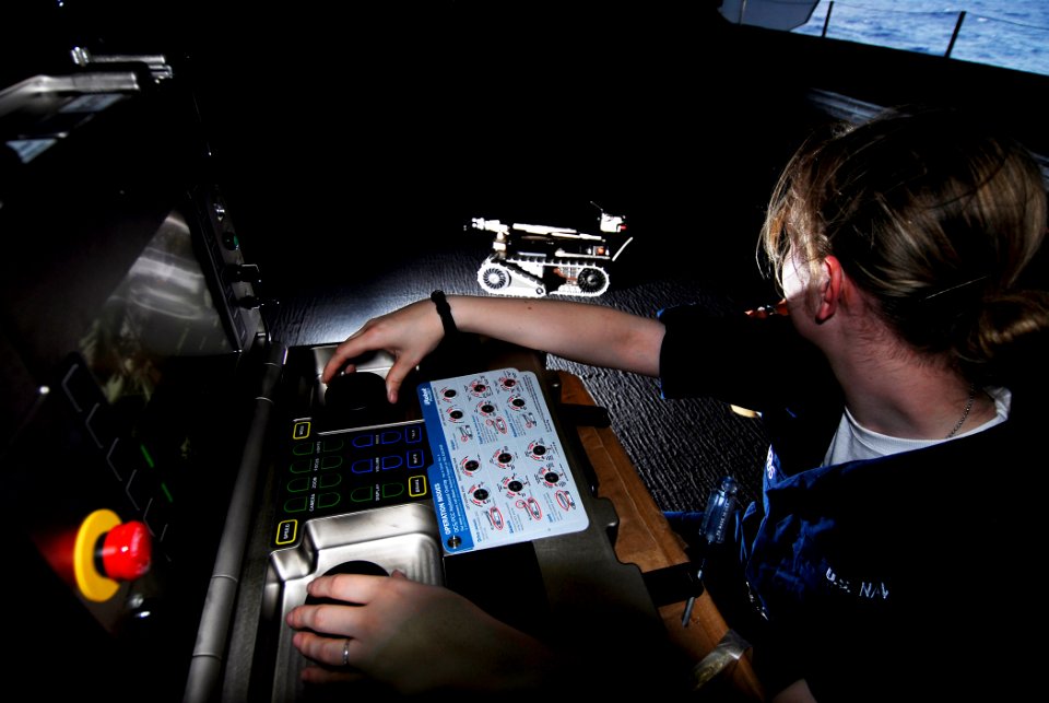 US Navy 090207-N-9610C-058 Quartermaster Seaman Alyssum Richards, from Sequim, Wash., familiarizes herself with the controls for