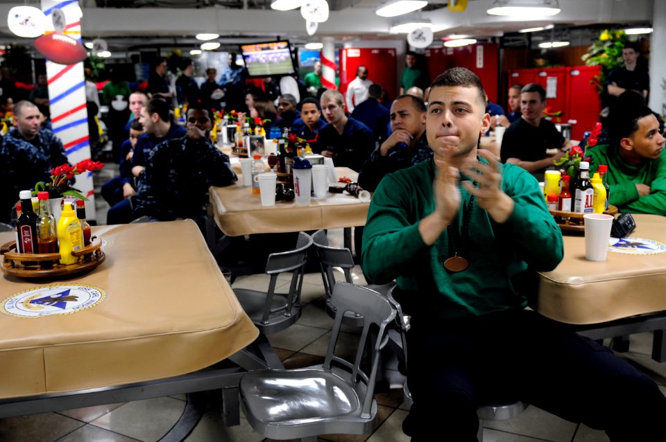 US Navy 120206-N-MD252-286 Sailors watch Super Bowl XLVI aboard the Nimitz-class aircraft carrier USS Carl Vinson (CVN 70)