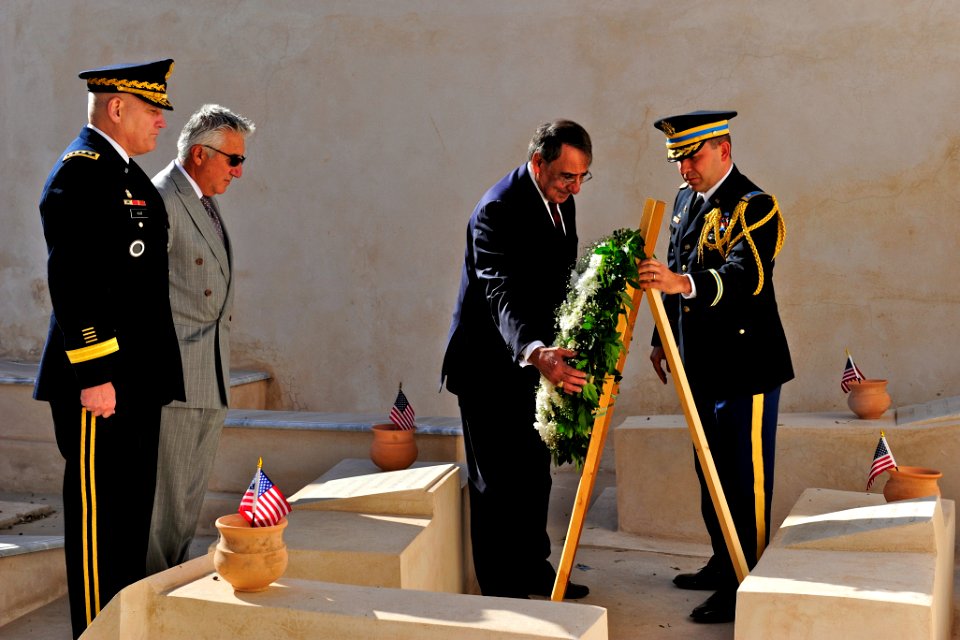 US Navy 111217-D-BW835-005 U.S. Defense Secretary Leon E. Panetta, right, tours a cemetery on the shores of Tripoli, Libya