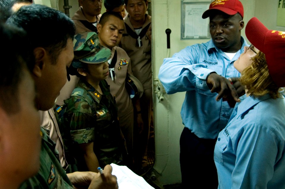 US Navy 090209-N-1251W-062 Sailors demonstrate how to cut contaminated clothing