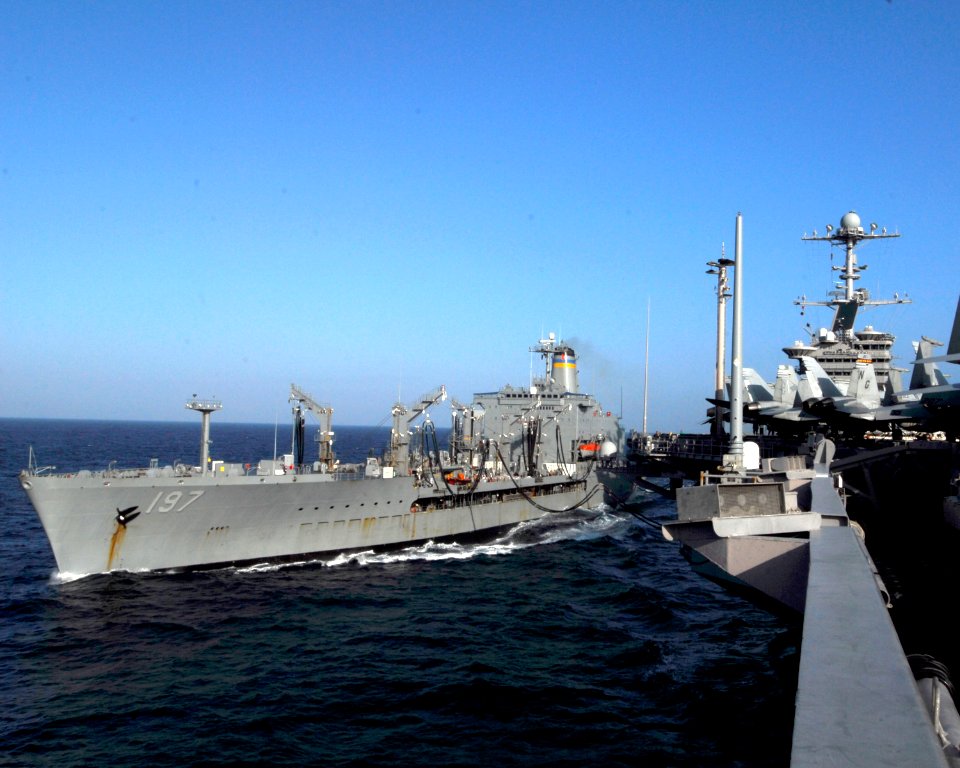 US Navy 090213-N-6538W-056 The Military Sealift Command fleet replenishment oiler USNS Pecos (T-AO 197), left, refuels the Nimitz-class aircraft carrier USS John C. Stennis (CVN 74)