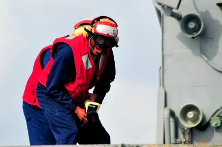 US Navy 090213-N-4774B-013 Members of a firefighting team aboard the guided-missile cruiser USS Lake Champlain (CG 57) participate in a fire control drill photo