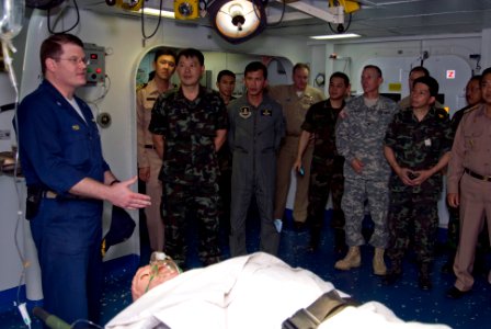 US Navy 090215-N-5215E-043 Cmdr. Michael Picio explains the medical capabilities of USS Essex (LHD 2) to members of the Royal Thai Navy during Cobra Gold 2009 (CG09)