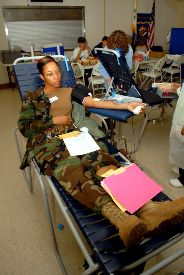 US Navy 090212-N-3674H-003 Construction Electrician Constructionman Recruit Valencia Biggs gives blood during a Red Cross blood drive