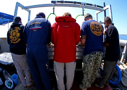 US Navy divers search for the remains of 5 un-accounted for service members from 1942 120730-N-OT964-468