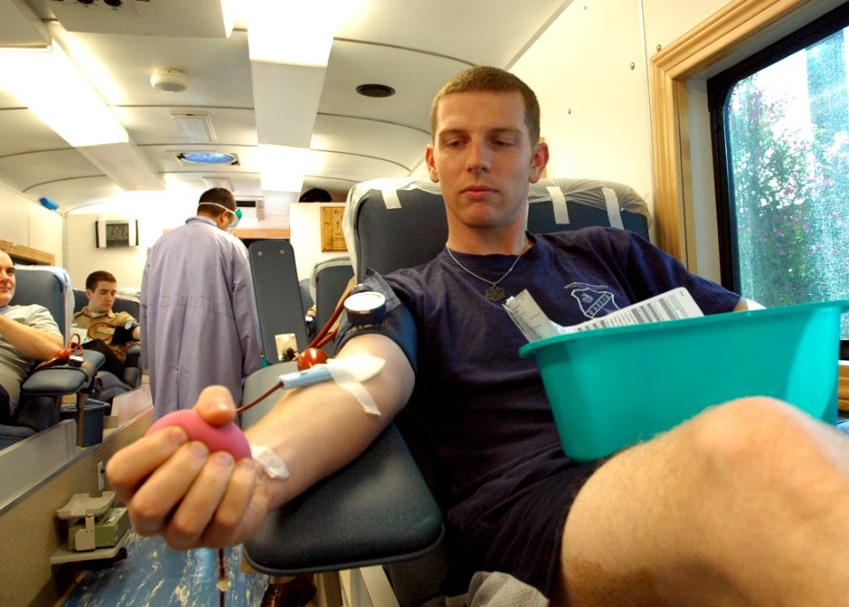 US Navy 090212-N-6326B-011 Hospital Corpsman 2nd Glen Mulkey donates a blood sample in the Mobile Blood Bank at Naval Medical Center San Diego (NMCSD)