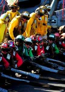 US Navy 090216-N-7571S-003 Flight deck personnel participate in a barricade drill aboard the aircraft carrier USS Theodore Roosevelt (CVN 71)