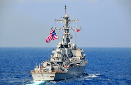 US Navy 090213-N-4774B-039 The guided-missile destroyer USS The Sullivans (DDG 68) flies the ship's battle flags during exercises at sea photo