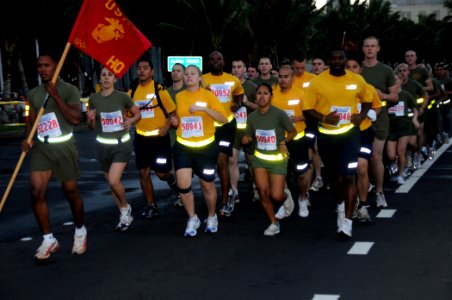 US Navy 090216-N-9758L-022 Sailors and Marines assigned to commands in the Hawaii region participate in the Sounds of Freedom division at the start of the 25th annual Hawaiian Telcom Great Aloha Run at Aloha Tower in Honolulu photo