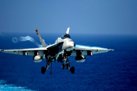US Navy 090215-N-8517C-676 An F-A-18C Hornet prepares for an arrested landing aboard USS John C. Stennis (CVN 74)