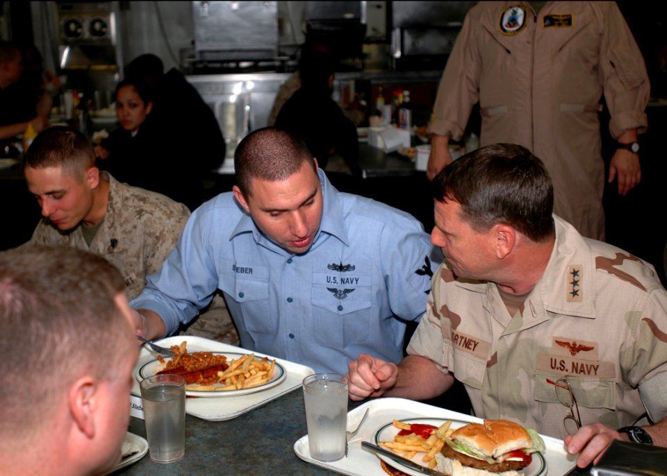 US Navy 090218-N-4236E-034 Vice Adm. Bill Gortney, commander, U.S. Naval Forces Central Command and U.S. 5th Fleet, eats lunch with Sailors and Marines aboard the amphibious assault ship USS Iwo Jima (LHD 7)
