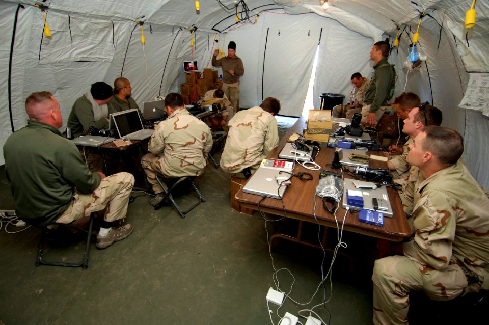 US Navy 090219-N-6477M-151 Sailors assigned to Fleet Combat Camera Group Pacific have their images critiqued in a tent at Marine Corps Base Camp Pendleton during Quick Shot 2009