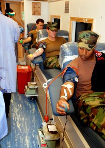 US Navy 090217-N-4973M-043 ailors assigned to Amphibious Construction Battalion (ACB) 1 donate blood to the Armed Services Blood Program at Naval Amphibious Base Coronado, Calif photo