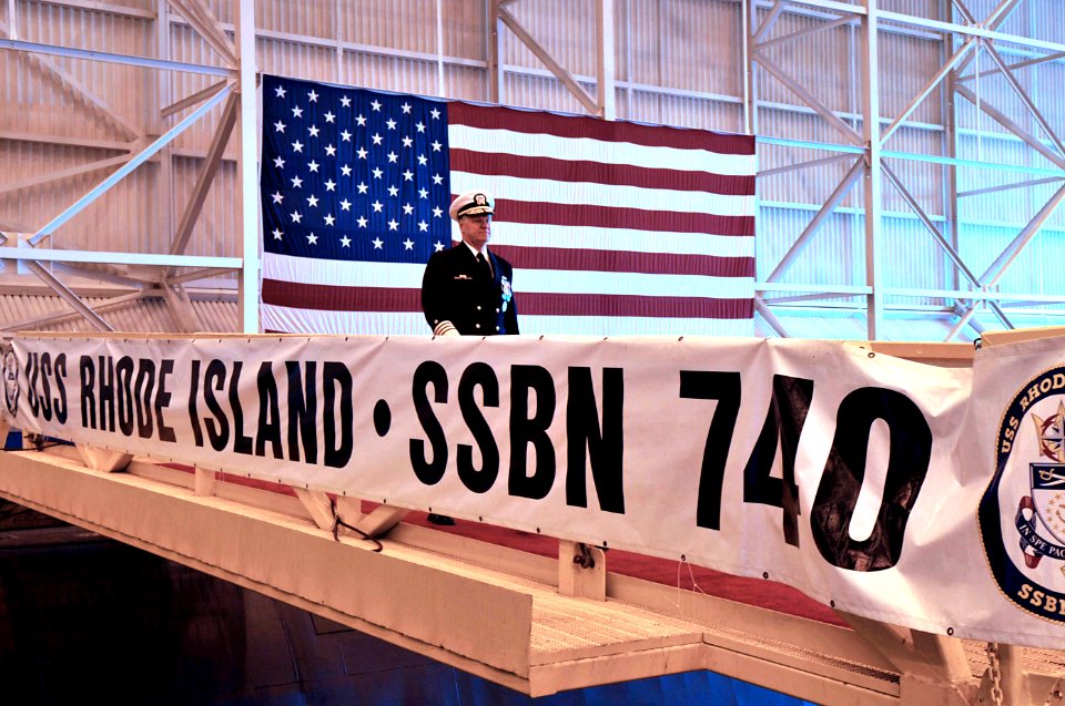 US Navy 090219-N-8273J-236 Dignitaries and guests stand during the national anthem at the start of the 1000th Trident Patrol Commemoration Ceremony at Naval Submarine Base, Kings Bay
