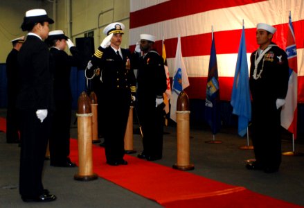 US Navy 090218-N-2984R-022 Capt. Joseph Clarkson salutes as he is piped aboard USS Harry S. Truman (CVN 75) by sideboys
