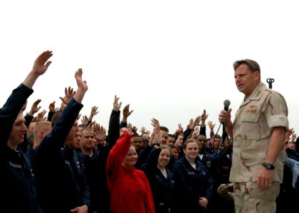 US Navy 090218-N-4236E-057 Vice Adm. Bill Gortney, commander, U.S. Naval Forces Central Command and U.S. 5th Fleet, speaks to Sailors and Marines on the flight deck of the amphibious assault ship USS Iwo Jima (LHD 7) photo