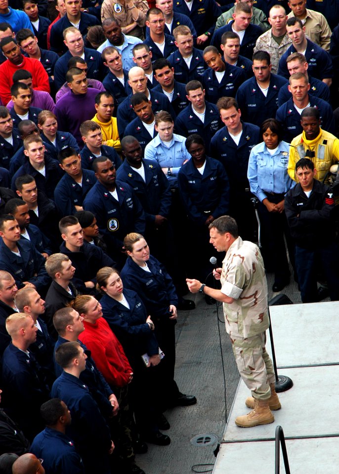 US Navy 090218-N-5681S-007 ice Adm. Bill Gortney, commander, U.S. Naval Forces Central Command and U.S. 5th Fleet, speaks to Sailors and Marines during an all-hands call on the flight deck of the amphibious assault ship USS Iwo