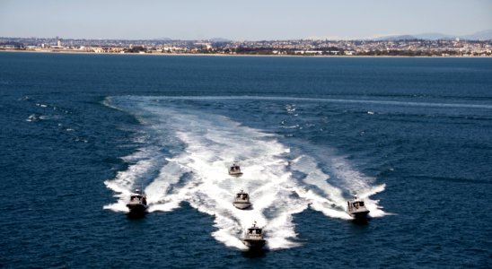 US Navy 090219-N-1722M-153 Several 34-foot Dauntless Sea-Ark's from Maritime Expeditionary Security Squadron (MSRON) 3 patrol the waters of San Diego Bay photo