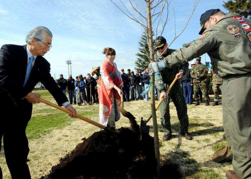 US Navy 090219-N-8534H-002 Capt. Eric W. Gardner and members of the Atsugi Navy Goodwill Society plant sakura, or cherry blossom trees