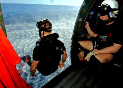 US Navy 090218-N-7280V-268 Information Systems Technician 2nd Class Kevin M. Abney, a search and rescue swimmer assigned to the amphibious command ship USS Blue Ridge (LCC 19)