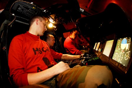 US Navy 090223-N-2475A-019 Sailors perform hellfire release and control checks on an MH-60S Sea Hawk