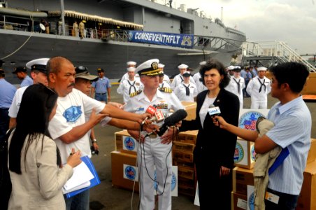 US Navy 090219-N-7280V-109 Rebecca Thompson addresses media with Capt. Thom W. Burke