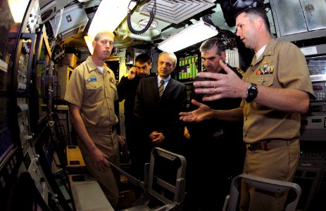 US Navy 090224-N-7705S-046 Cmdr. Tyler Meador, right, describes sonar room operations to Vice Adm. Georgios Karamalikis, Chief of Hellenic (Greek) Navy General Staff