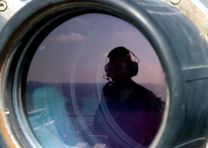 US Navy 090223-N-4236E-069 Seaman Randal Craighead stands lookout watch aboard USS Iwo Jima (LHD 7)