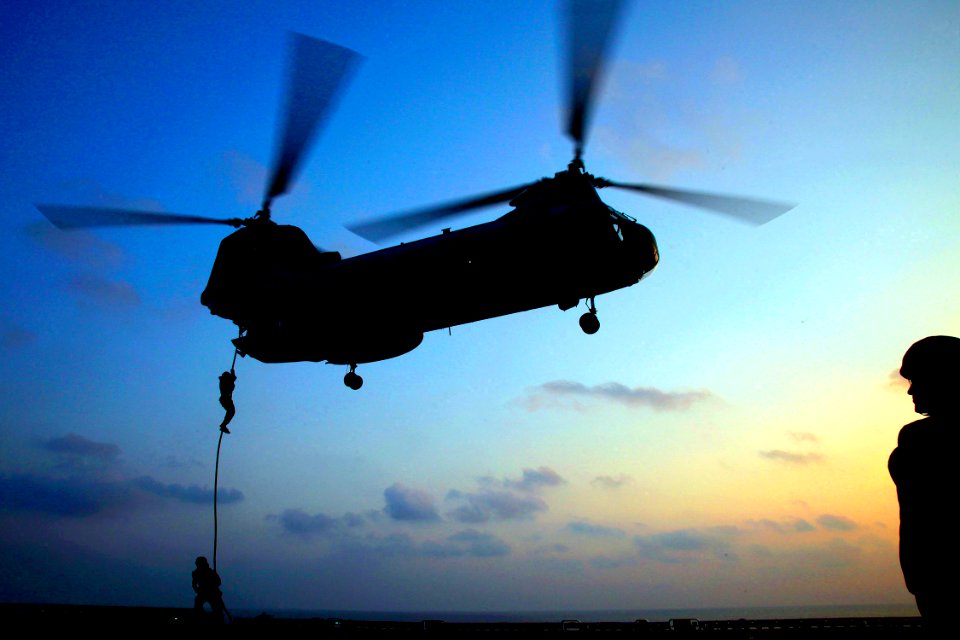 US Navy 090225-N-9150R-065 Marines board a CH-46E Sea Knight helicopter