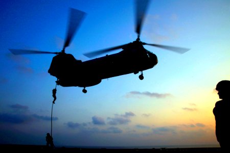 US Navy 090225-N-9150R-065 Marines board a CH-46E Sea Knight helicopter photo