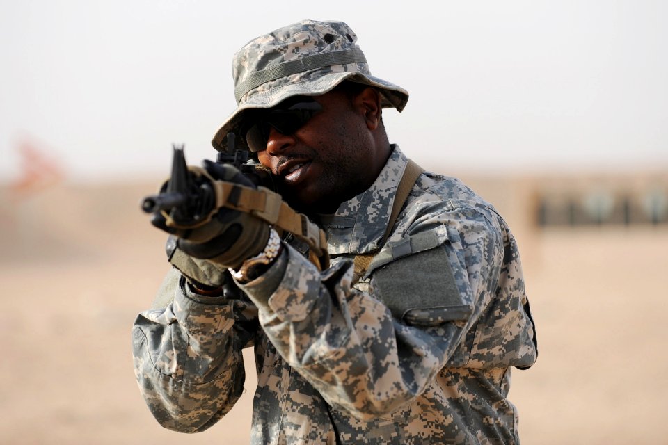 US Navy 090226-N-0636S-001 Information Systems Technician 1st Class Robert Williams participates in close quarters marksmanship training before deploying to Kabul, Afghanistan