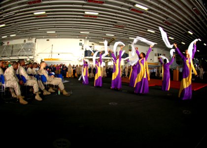 US Navy 090226-N-4236E-047 Sailors and Marines watch a dance performance during a Black History Month celebration