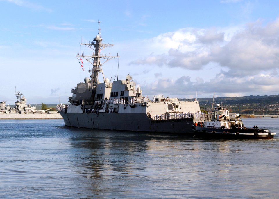 US Navy 090224-N-9758L-078 The Pearl Harbor-based guided missile destroyer USS Chafee (DDG 90) is guided out of the harbor by tugboats assigned to Naval Station Pearl Harbor as she departs for a scheduled deployment to the west