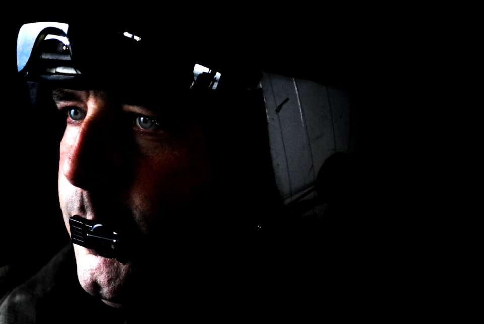 US Navy 090223-N-2984R-091 Chief Naval Air Crewman Troy Rankin observes flight operations aboard USS Harry S. Truman (CVN 75)