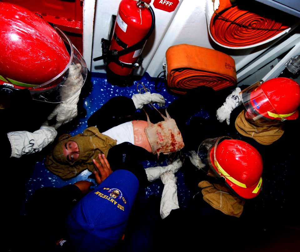 US Navy 090226-N-6538W-120 Sailors provide simulated medical treatment to a mock personnel casualty