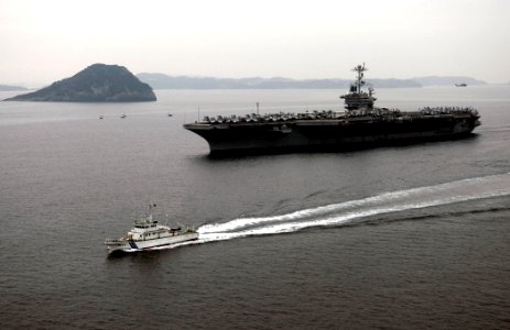 US Navy 090227-N-9928E-156 The Nimitz-class aircraft carrier USS John C. Stennis (CVN 74) transits to its anchoring point in Sasebo Ko, Japan photo