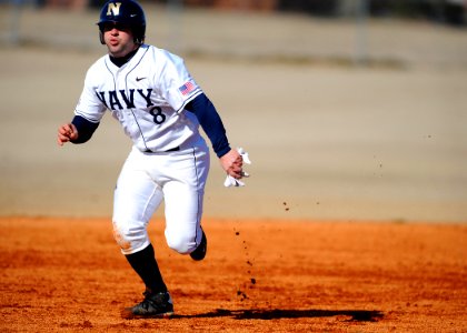 US Navy 090222-N-7948R-002 Navy catcher Steven Soares rounds second base during a 3-1 victory against Pittsburgh at the annual Service Academy Spring Classic Baseball Tournament