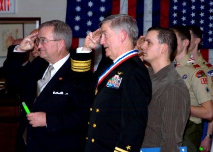 US Navy 090228-N-2013O-174 Rear Adm. James D. Kelly renders the Boy Scout salute