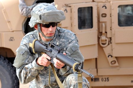 US Navy 090226-N-0636S-004 Operations Specialist 1st Class Luis Vazquez participates in security training during a convey exercise at Udari Range