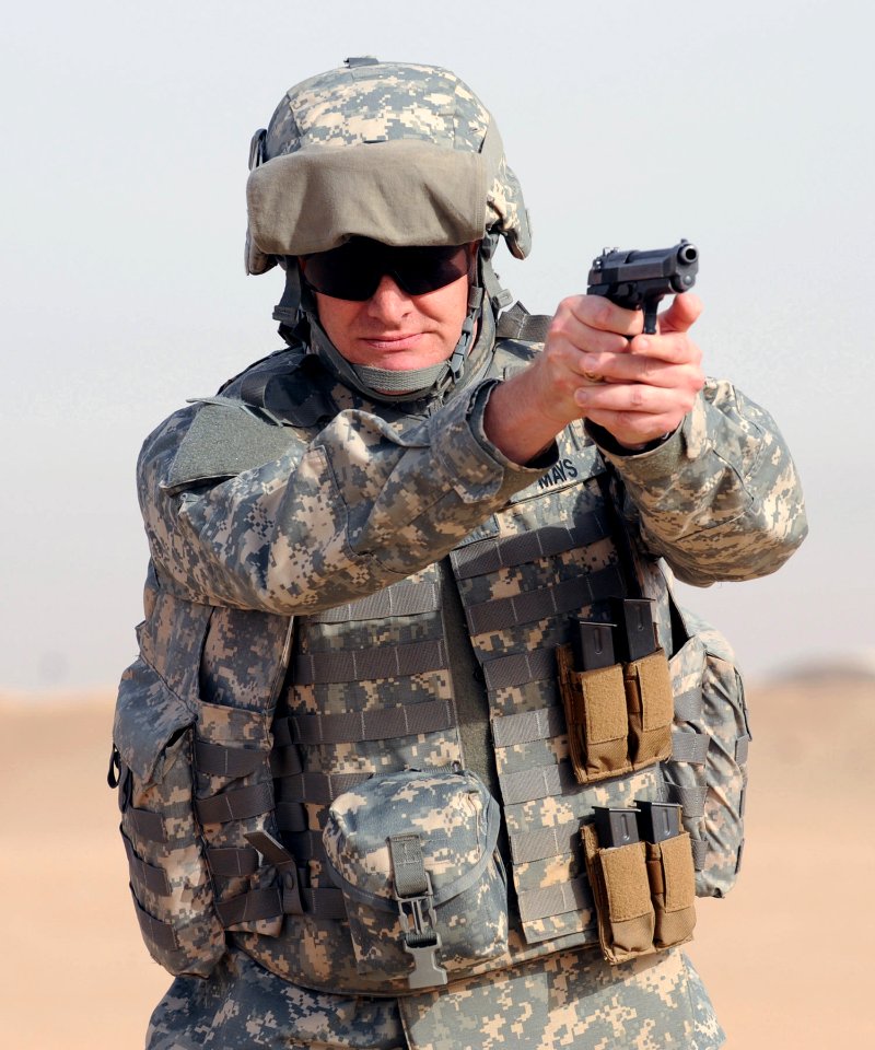 US Navy 090226-N-0636S-003 Cmdr. Kenneth Mays participates in close quarters marksmanship training before deploying to Kabul, Afghanistan