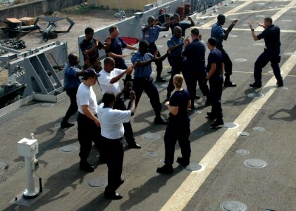 US Navy 090225-N-1655H-001 Coast Guardsmen review visit, board, search ^ seizure procedures with Ghanaian Sailors