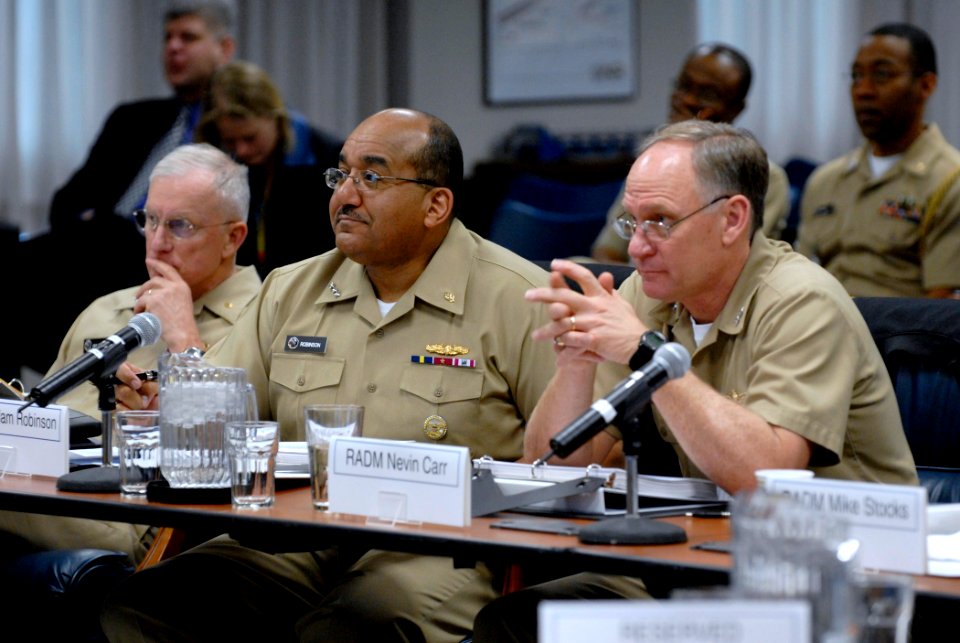 US Navy 090227-N-7676W-020 Rear Adm. Thomas R. Cullison and Vice Adm. Adam Robinson join Rear Adm. Nevin P. Carr Jr. for briefs