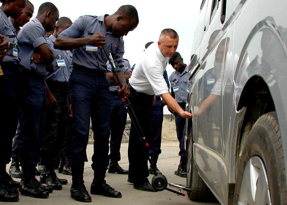 US Navy 090226-N-1655H-150 Chief Master-at-Arms Clarence O'Dell, explains proper vehicle search procedures to Ghanaian Sailors during an Africa Partnership Station port security training exercise