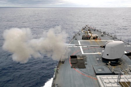 US Navy 090301-N-9123L-001 USS John S. McCain (DDG 56) fires its MK-45 five-inch gun system
