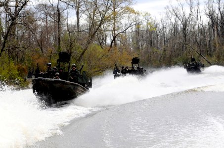 US Navy 090304-N-8933S-037 Special Warfare Combatant-craft Crewmen (SWCC) assigned to Special Boat Team (SBT) 22 conduct live-fire drills at the riverine training range at John C. Stennis Space Center photo