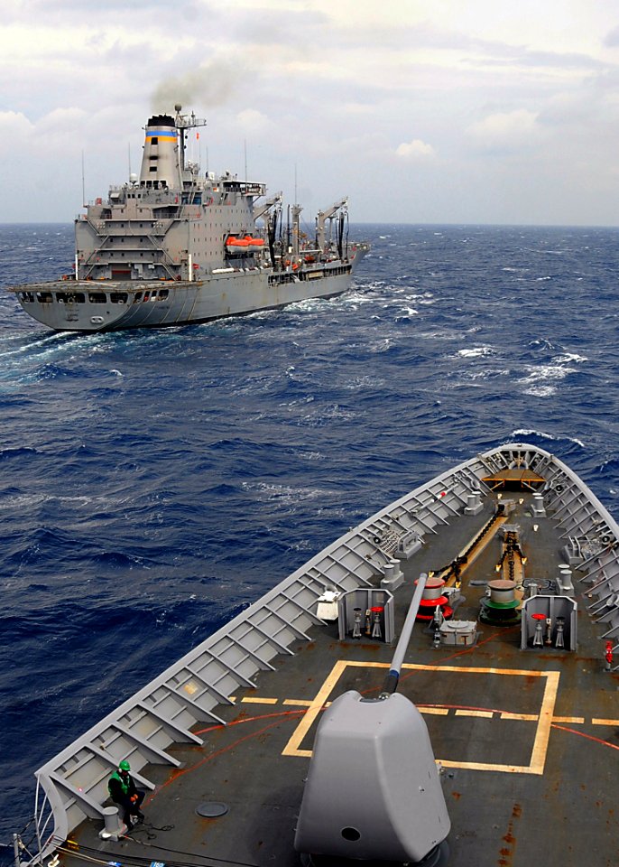 US Navy 090228-N-1082Z-056 USS Vella Gulf (CG 72) approaches the Military Sealift Command fleet replenishment oiler USNS Laramie (T-AO 203)