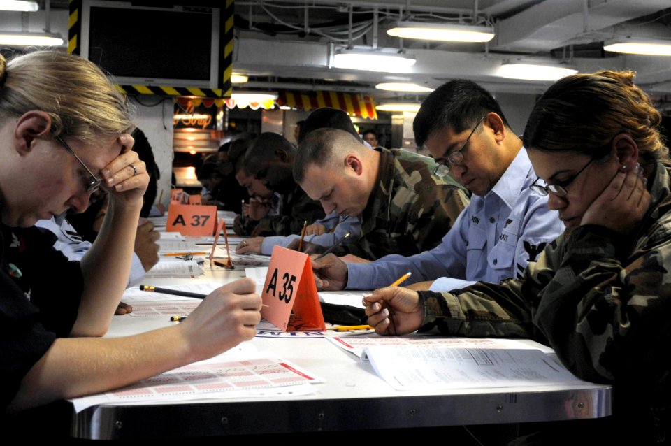 US Navy 090305-N-3589B-039 Sailors take the E-6 advancement exam aboard the nuclear-powered aircraft carrier USS Nimitz (CVN 68)