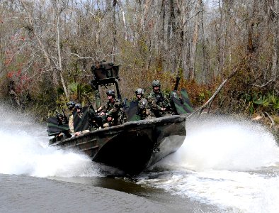 US Navy 090304-N-8933S-027 Special Warfare Combatant-craft Crewmen conduct live-fire drills photo